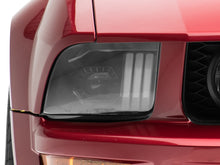 Load image into Gallery viewer, Raxiom 05-09 Ford Mustang w/ Halogen Projector Headlights- Black Housing (Clear Lens) (No GT500 )