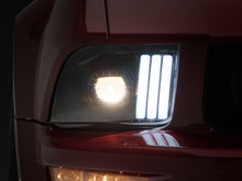 Load image into Gallery viewer, Raxiom 05-09 Ford Mustang w/ Halogen Projector Headlights- Black Housing (Clear Lens) (No GT500 )