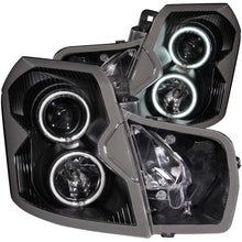 Load image into Gallery viewer, ANZO 2003-2007 Cadillac CTS Projector Headlights w/ Halo Black (CCFL)