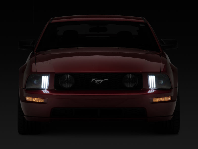 Raxiom 05-09 Ford Mustang w/ Halogen Projector Headlights- Black Housing (Clear Lens) (No GT500 )